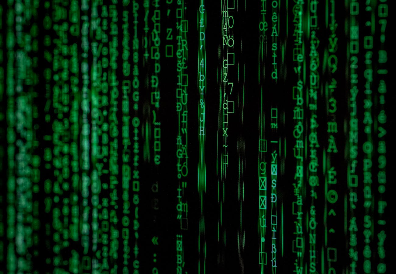 Green digital code background representing secure data and email migrations